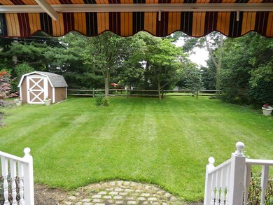 Private rear yard and storage shed.  Lot is 150' i