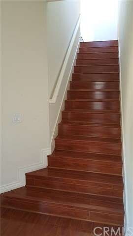 Stairway entry leads you up to your cozy home