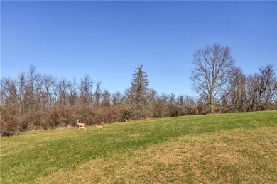 Surrounded by nature, mature trees, and wildlife,