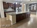 Kitchen with dark countertops