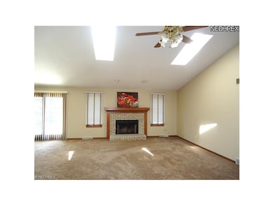 Vaulted great room with skylights for natural ligh