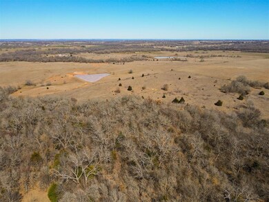 Aerial overview of property's location with rural landscape