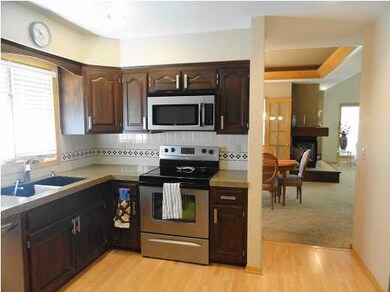 KITCHEN WITH WOOD LAMINATE FLOORING
