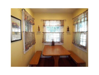 Kitchen. A built-in breakfast nook adds to the cha
