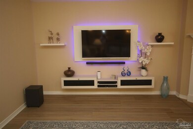 LED panel, floating shelves & cabinets.