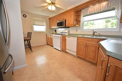 KITCHEN IS CHEERY AND HAS LOTS OF LIGHT!