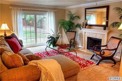 Large family room offers stone fireplace, new slid
