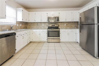 1601 Shelby Dr, Raymore, MO 64083 - photo 7