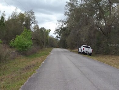view of 202 ct. south end of street from lot.
