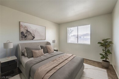 Virtually staged primary bedroom with window