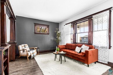 Living room featuring a wealth of natural light, o