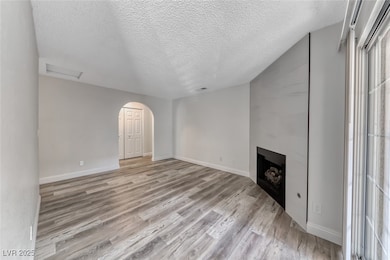 Living room w/ceiling fan & light, w/luxury vinyl