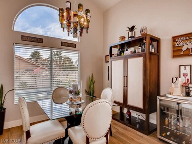 Formal dining room with vaulted ceiling