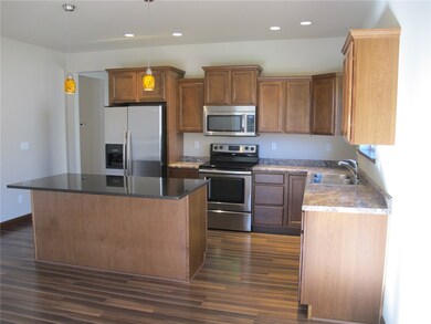 Kitchen, maple cabinets, granite top on island