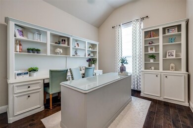 Private office with vaulted ceiling, ceiling fan a