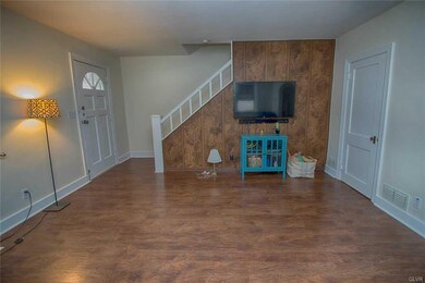 Family room with coat closet.