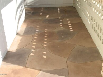 Sidewalk to entrance of home