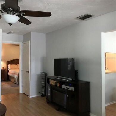 Right side of Living room as you walk in front doo