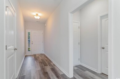 Foyer with light wood-type flooring