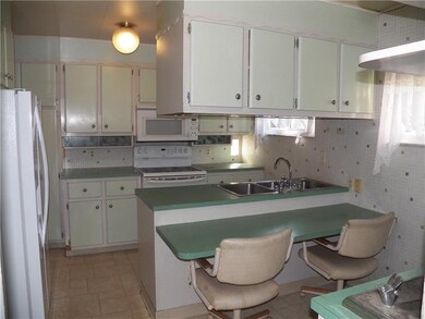 Nice size Fully equipped Kitchen in this home with