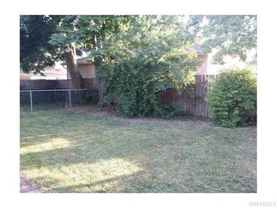 Backyard. Good sized yard fully fenced. Also a fen