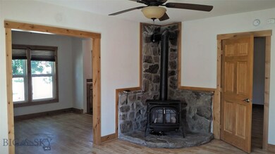 Living Area (Right) and Dining Area (Left)