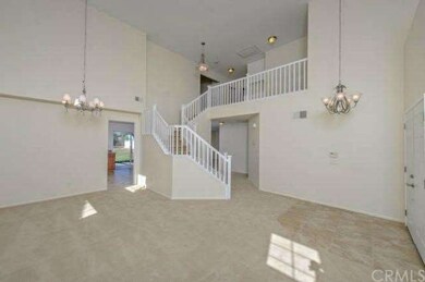 Living area looking into family and kitchen as wel