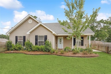 3 bed 2 bath with sunroom on 1/2 acre lot