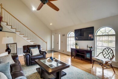 The great room with its vaulted ceiling will welcome you as you step into the home.