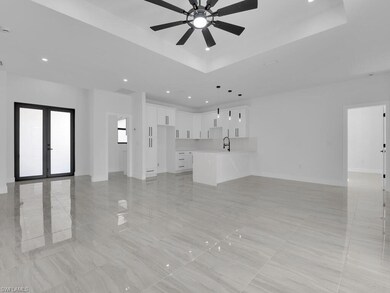 Unfurnished living room with french doors, ceiling