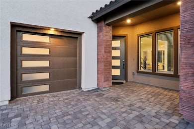 Property entrance with modern tiled facade