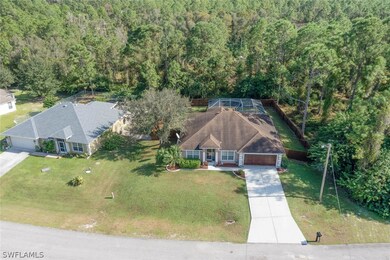 809 Grenada Ave, Lehigh Acres, FL 33974 - photo 2