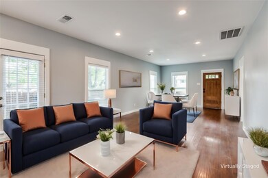 Living room featuring dark wood-type flooring and 