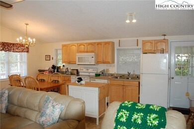 Open kitchen to outside porch for picnic.