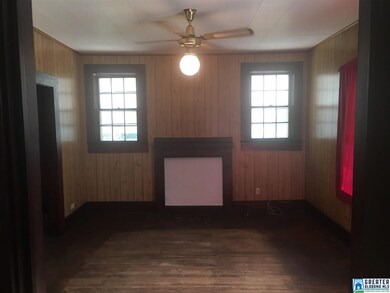 Has fireplace which could be made usable again.