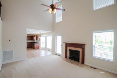 Living Area, with LOTS of light, and Fireplace