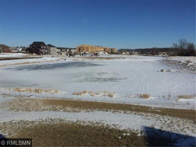 Rear yard on large pond provides distance to other