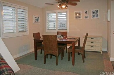Dining Room w/Plantation Shutters & Ceiling Fan