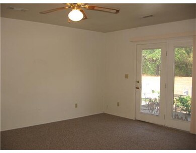 Master Bedroom. Door in Master bedroom leads to back yard patio.