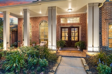 This photo showcases an inviting entrance with ele