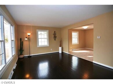 Living Room - Refinished gleaming hardwood floors!