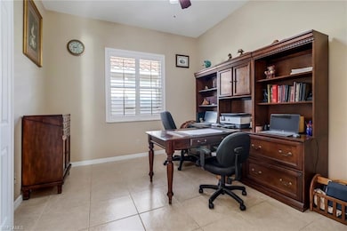 Office space with light tile patterned flooring an
