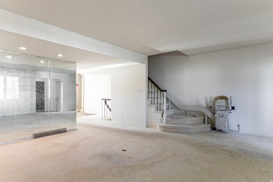 Carpeted spare room with recessed lighting