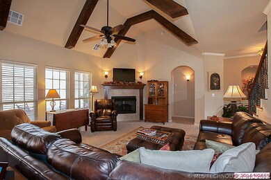 The beams accent the high coffered ceiling.