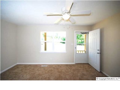 THE FAMILY ROOM IS 15 X 12 WITH NEW CARPET, CEILING FAN AND FRESH PAINT.