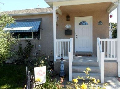Inviting Front Covered Entry.