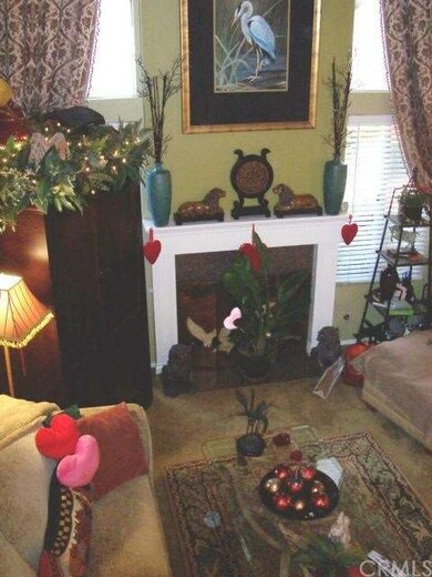 Looking from the stairway down to living room with