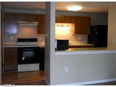 Kitchen - Kitchen with bar/pass through, wood floo