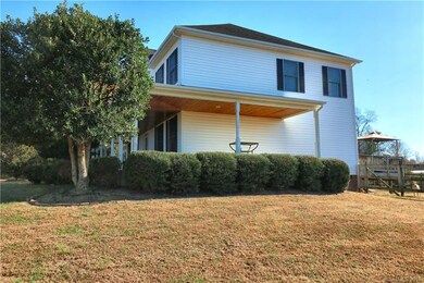 Side View of home showing covered porch and rear d