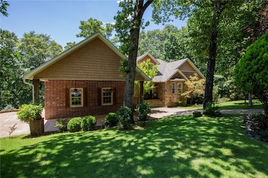 Additional covered parking or seating area with ceiling fans.